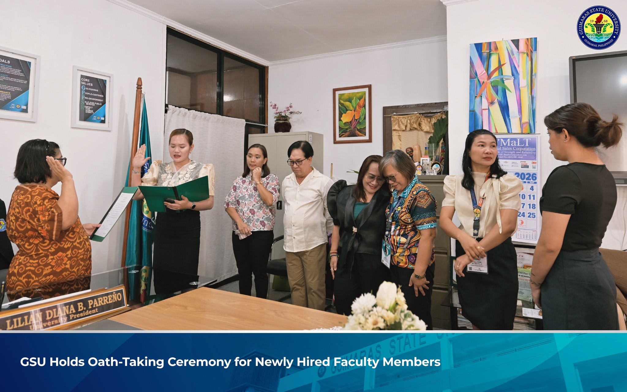 Newly hired faculty members during oath-taking